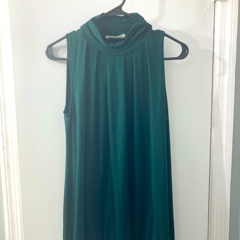 Green turtleneck shirt